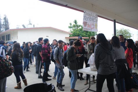 Students patiently wait for a refreshing cup of Agua Fresca and Horchata.
