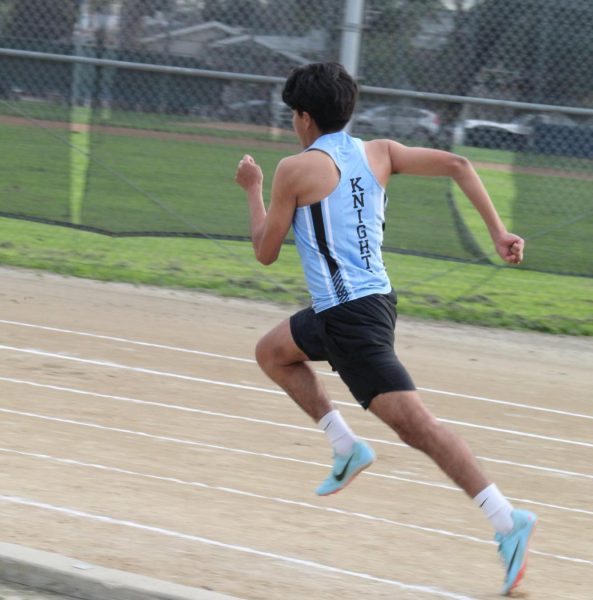 Track and field captain junior Eduardo Morales racing his heart out at a league race.