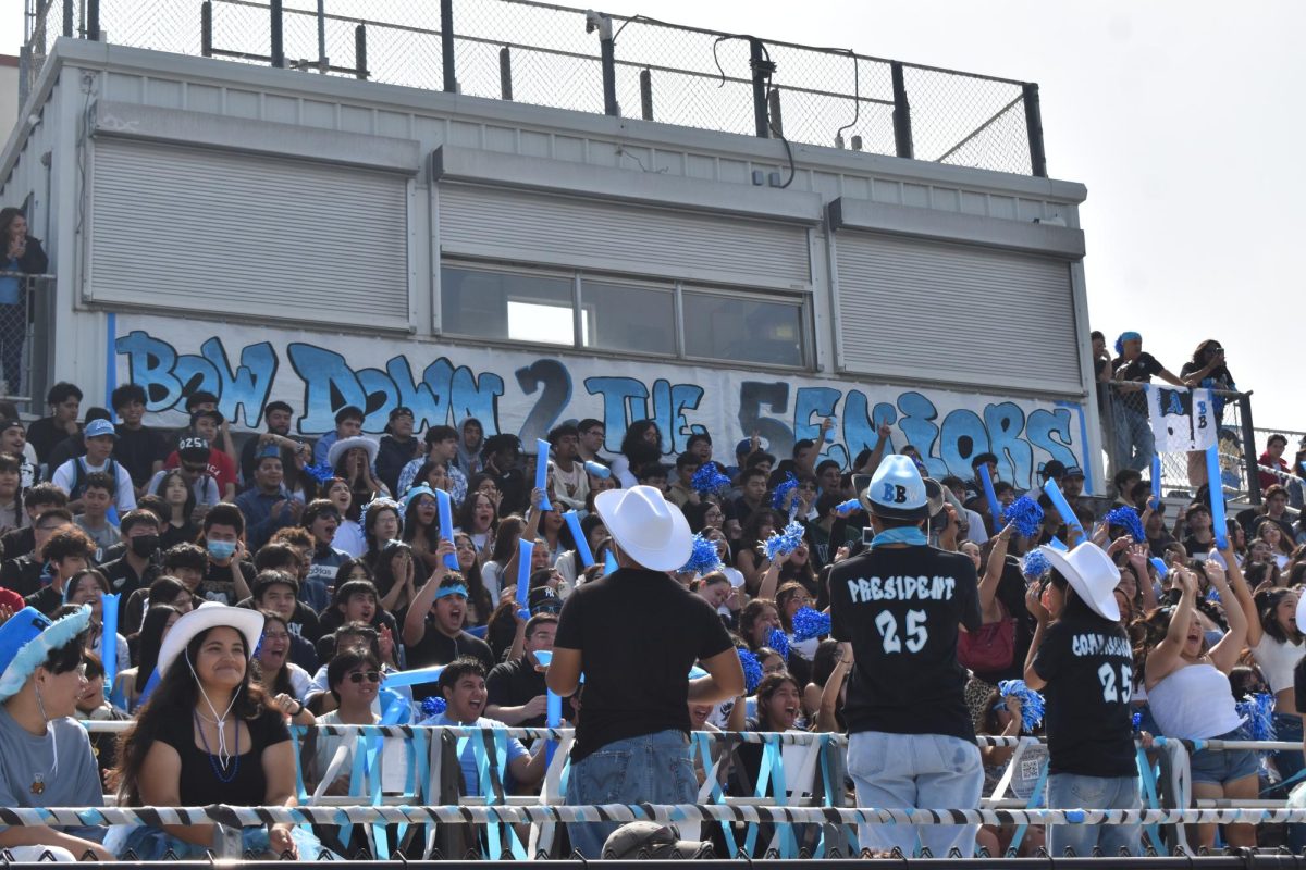 Senior section going wild for Mr. Tran's epic  victory during the teacher skit.