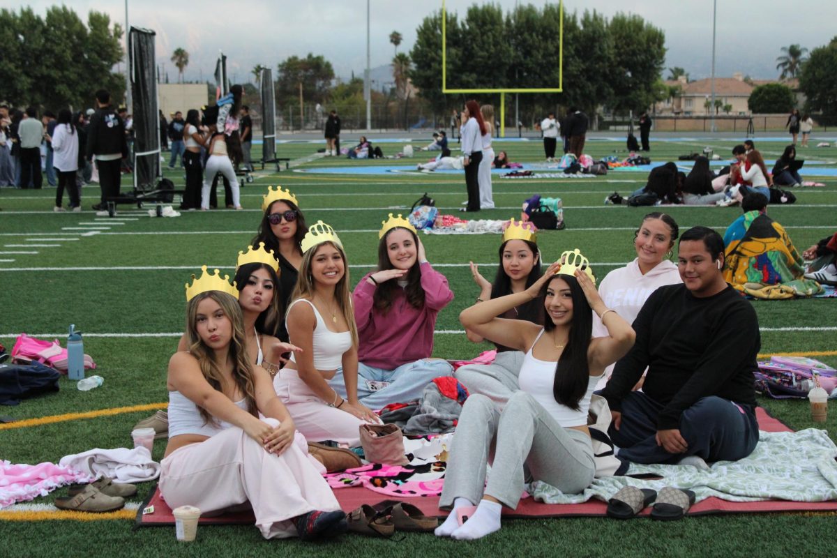 Seniors gathered all together on the field.