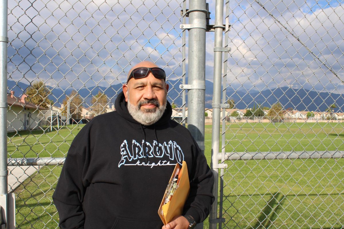 This is Coach Santoyo. He was the coach for girls' Flag Football. 