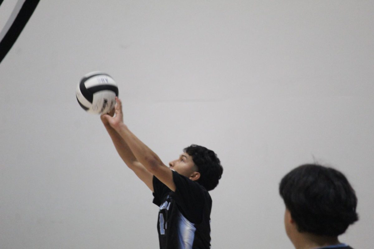 Randy Zavaleta In the reach for the ball.